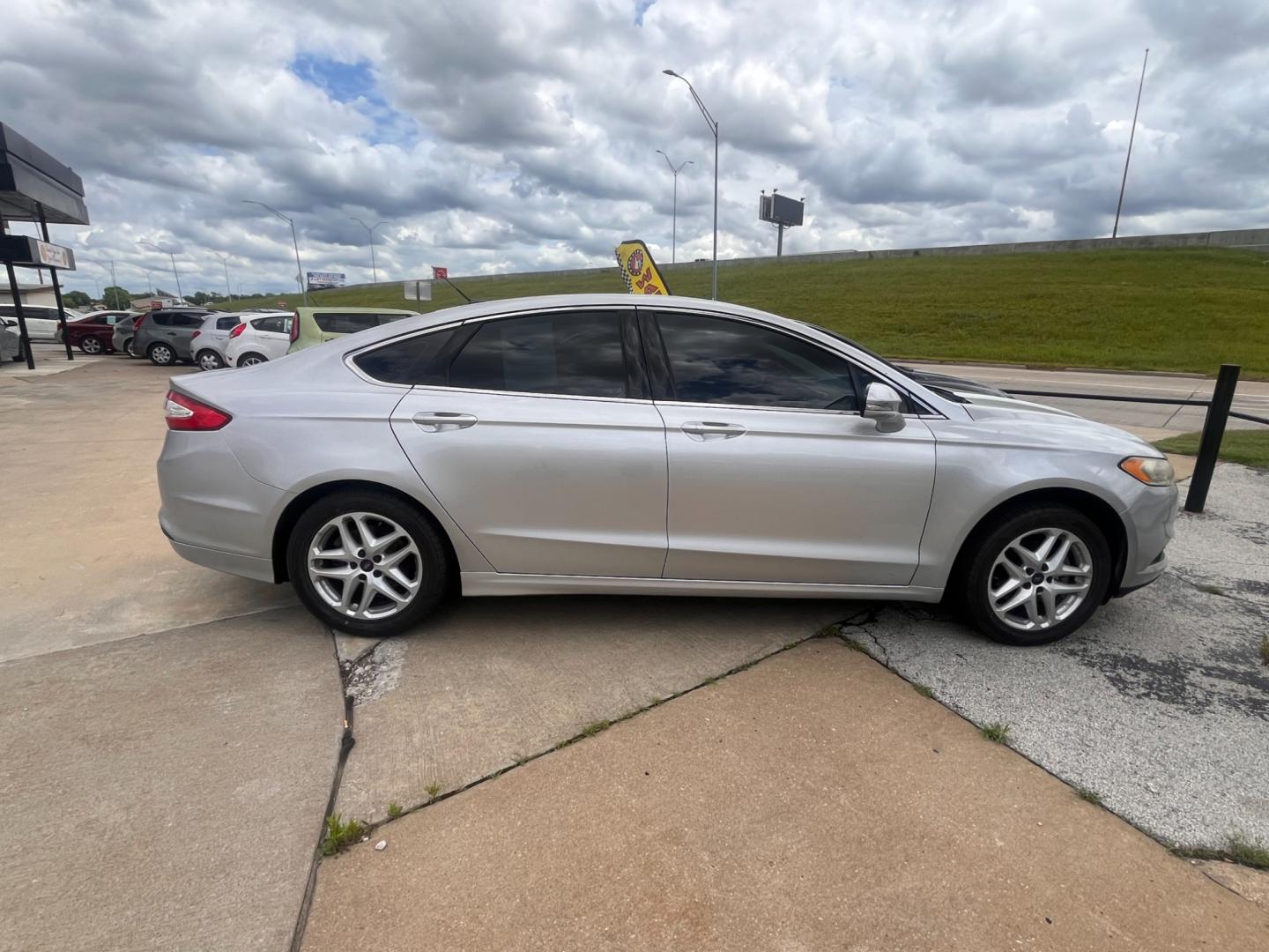 2016 SILVER FORD FUSION SE SE (1FA6P0HD3G5) with an 1.5L L4 DOHC 16V engine, 6-Speed Automatic transmission, located at 8101 E. Skelly Dr., Tulsa, OK, 74129, (918) 592-3593, 36.121891, -95.888802 - Photo#1